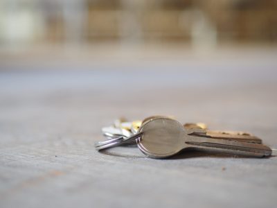 house keys on the ring on table in a room. Bunch of apartment keys. To forget keys at home concept ,